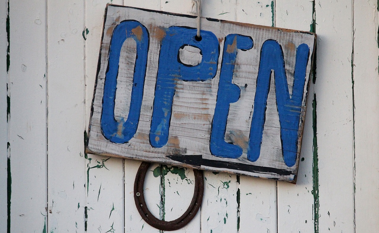 Open sign in a storefront door